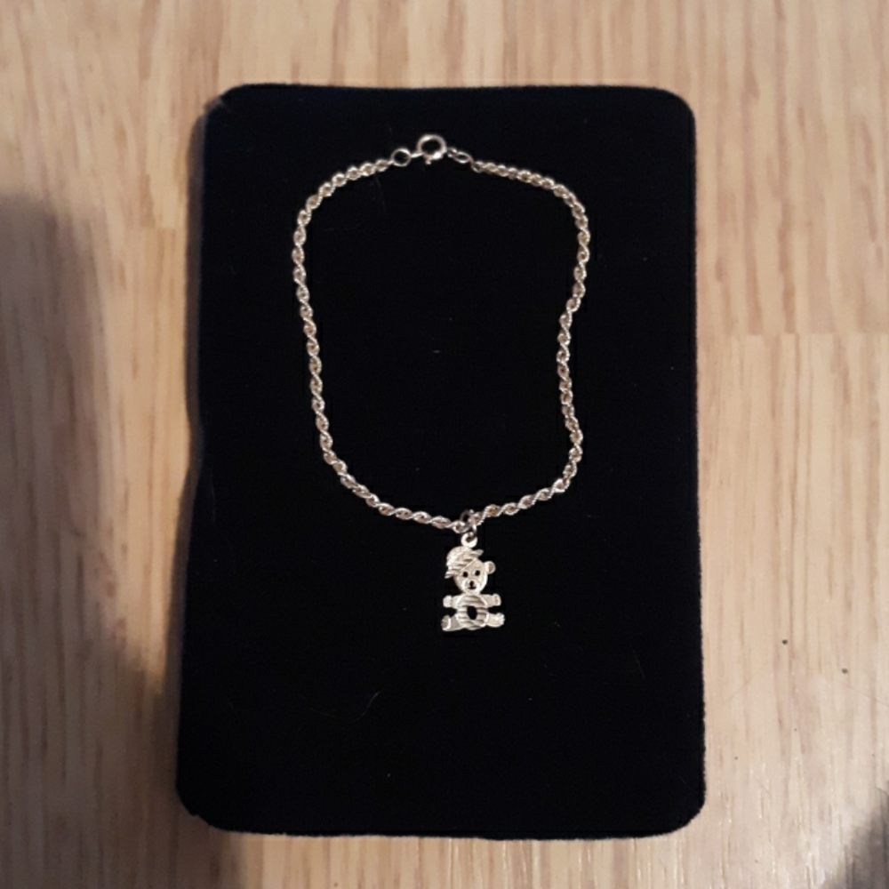 Gold bracelet with bear charm